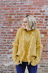 MUSTARD FRINGE CABLE KNIT SWEATER