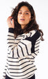IVORY SWEATER WITH BLACK STRIPES